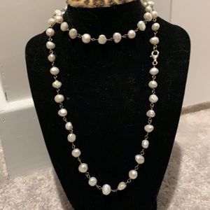 Silpada hand crafted pearl necklace to wear long or double wrap.